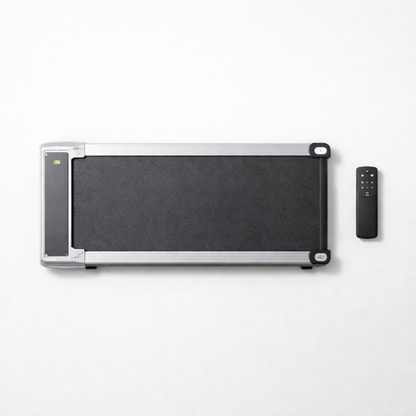 Portable treadmill with remote control on a white background